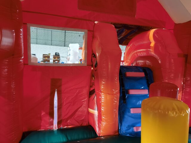 Holiday Themed Bounce House and Slide