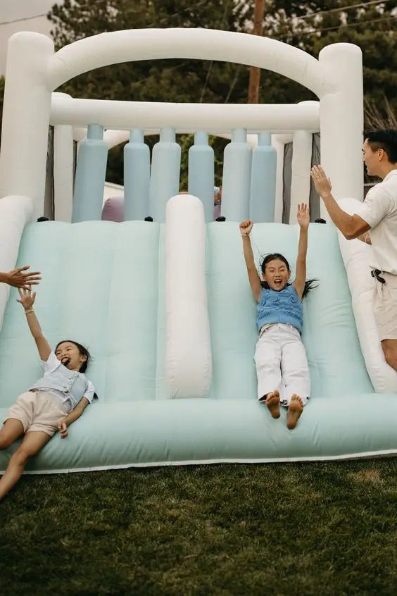 Pastel Inflatable Bounce House with Obstacles