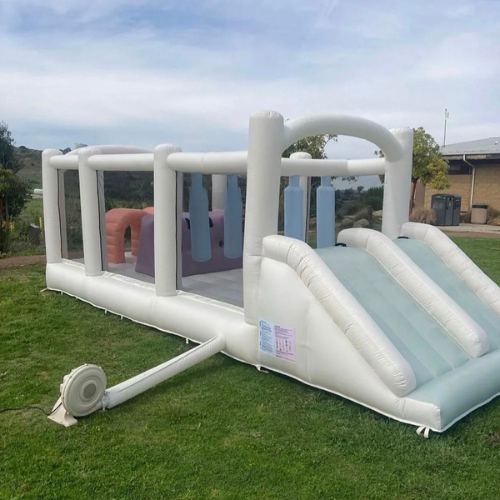 Pastel Inflatable Bounce House with Obstacles