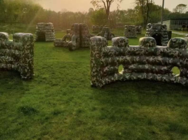 Camo airsoft bunker field at sunset