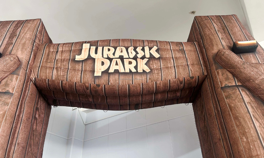 Dinosaur-Inspired Inflatable Arch for Outdoor Promotion