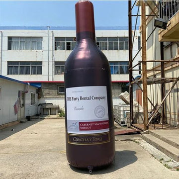 Anunciante de botella de champán inflable gigante