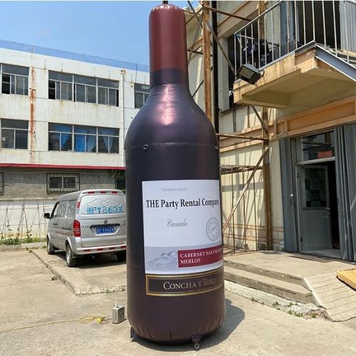 Anunciante de botella de champán inflable gigante